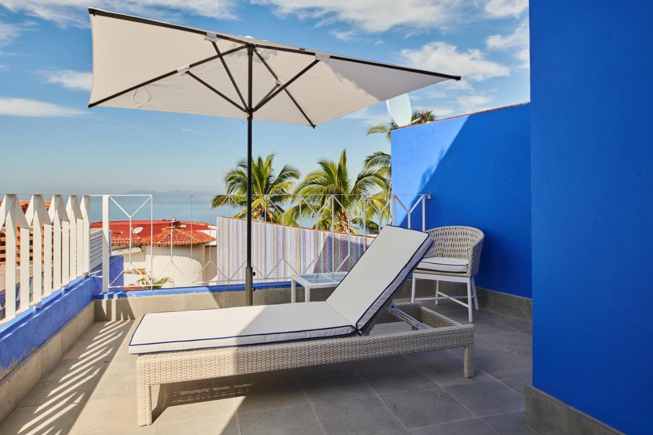 Hotel Luxury Patio Azul (Adults Only) 巴亞爾塔港 外观 照片 A cantilever umbrella