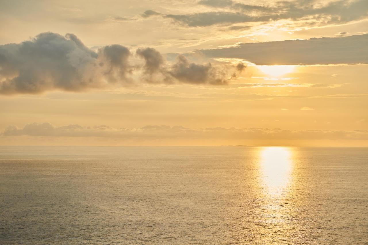 Hotel Luxury Patio Azul (Adults Only) 巴亞爾塔港 外观 照片 Sunset over the Atlantic Ocean